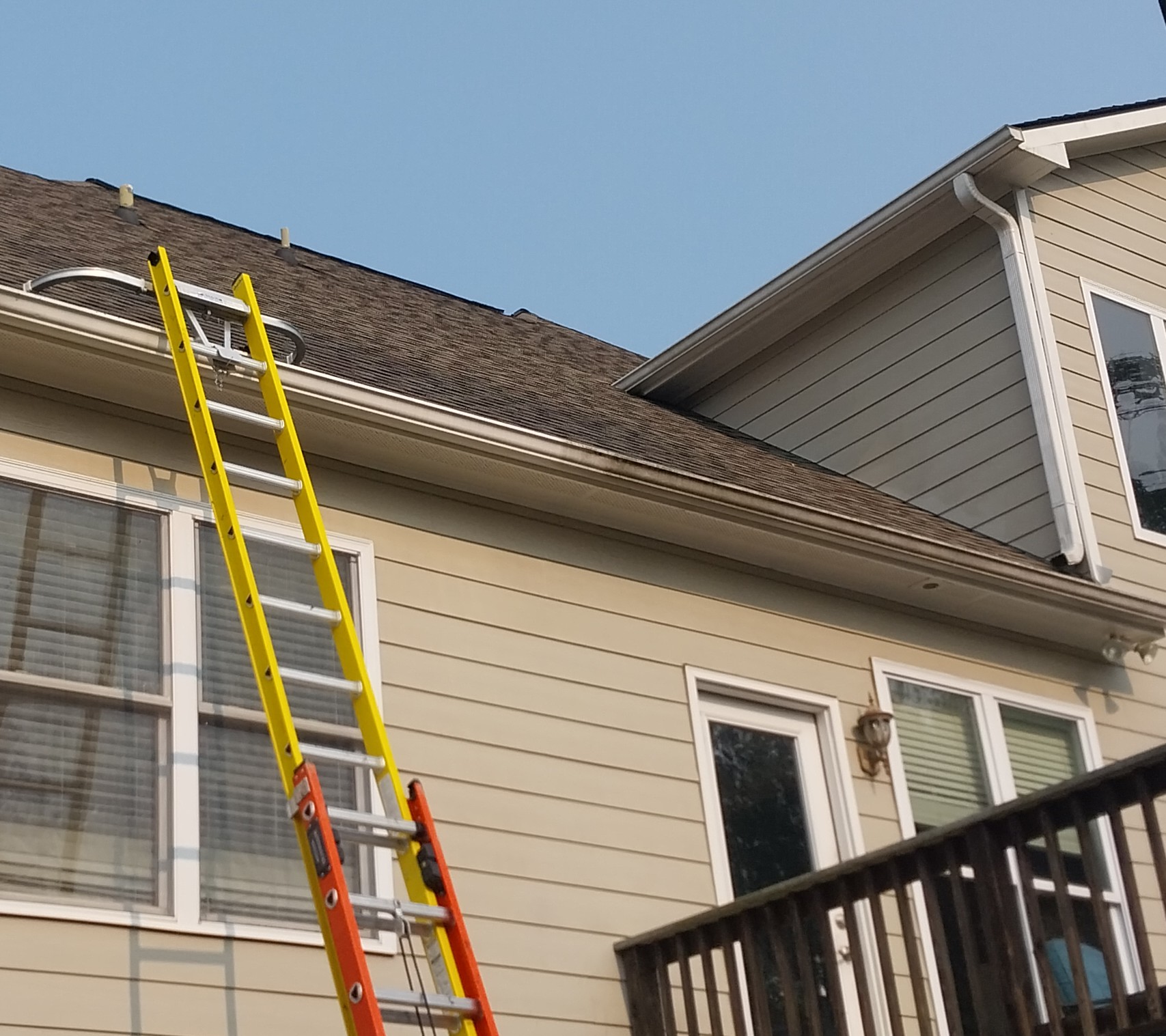 Are Your Gutters Covered With Dark Streaks Like This Home In Gainesville, GA?